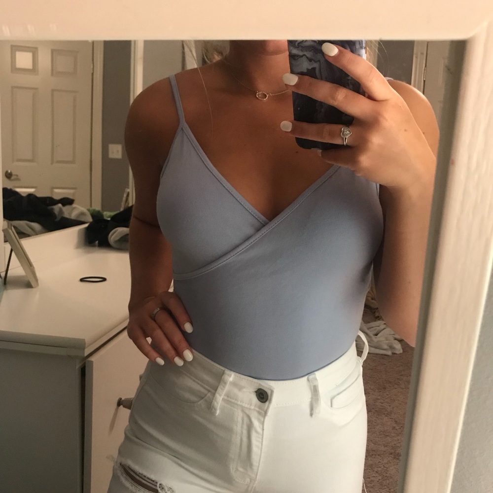 Light blue cross top bodysuit